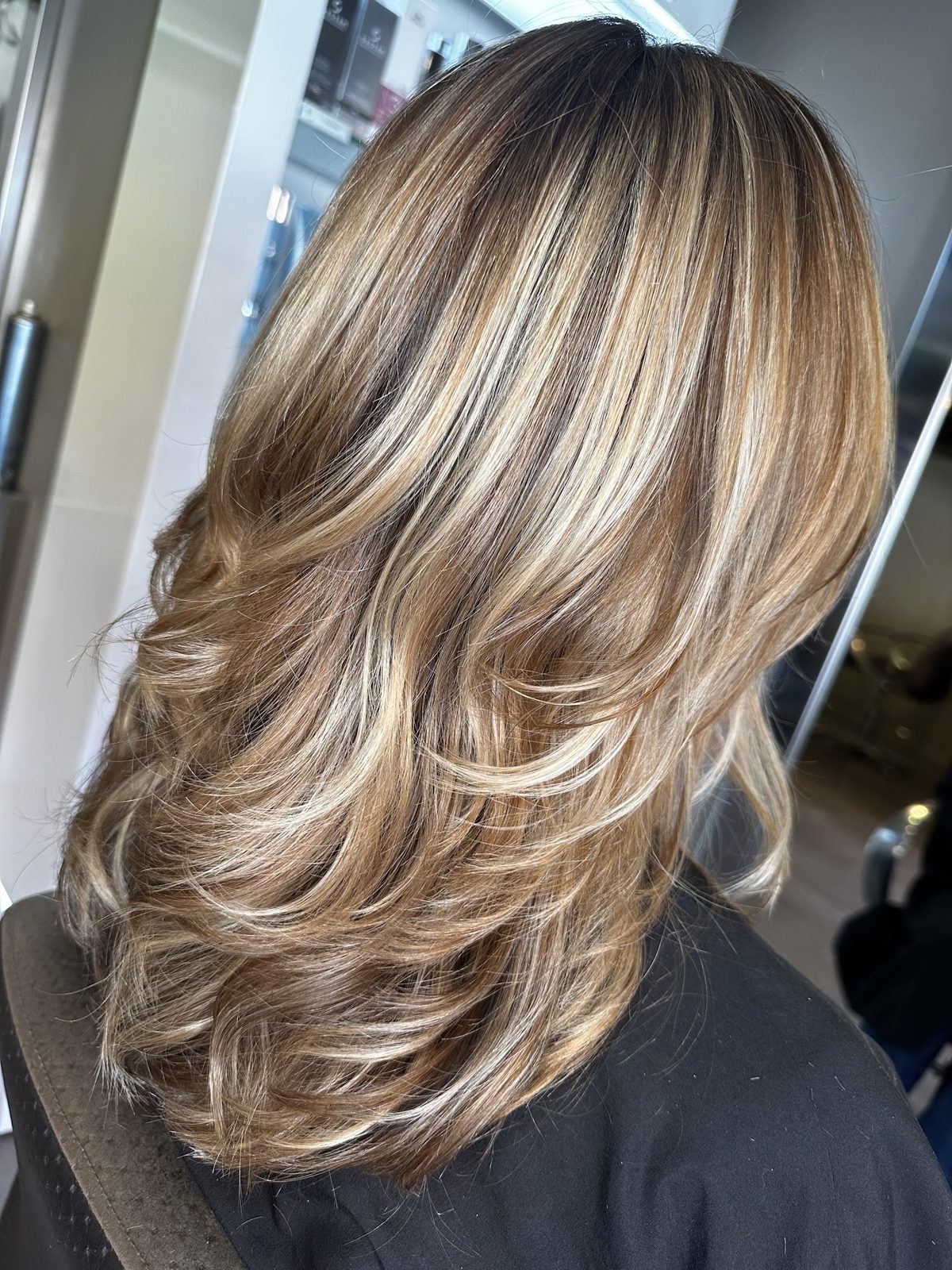 Soft blonde balayage finished at HAIR38, natural lived in tone